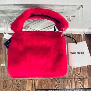 stand studio luna bolsa